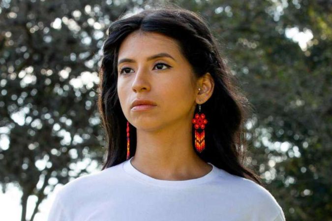 Ashley Solis is posing for the photo.